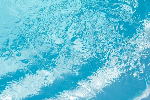 Water waves in a blue pool Stock Photos