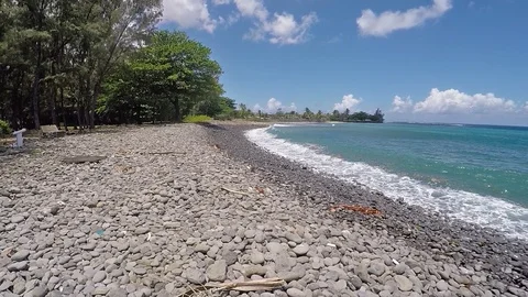 Water waves breaking at beach in low angle 動画素材 89943779