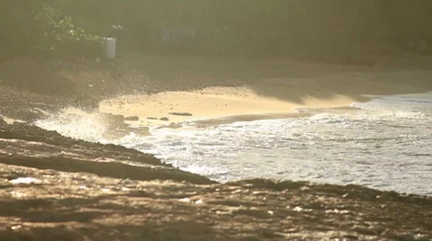 Water waves breaking in sand on the beach Stock Footage 8762475