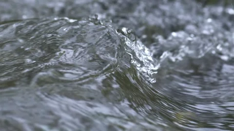 Water waves flows in mountain stream background Stock Footage 275654769
