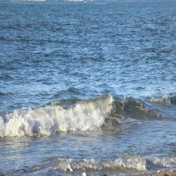 Water waves in the ocean Stock Photos