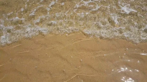 Water waves on a sand beach 스톡 동영상 89957538