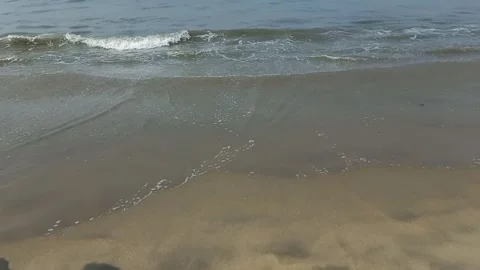 Water waves on sandy beach ,world largest sea beach Cox's Bazar Video stock 274721562