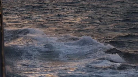 Water waves. Ships side view, moving through the waves. View from the side deck Stock Footage 143614677