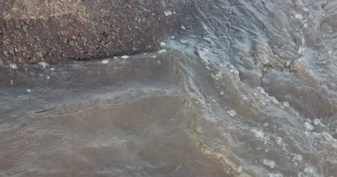 Water Waves on a stone Stock Footage 320332820