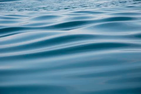 Water waves on watersurface Stock Photos