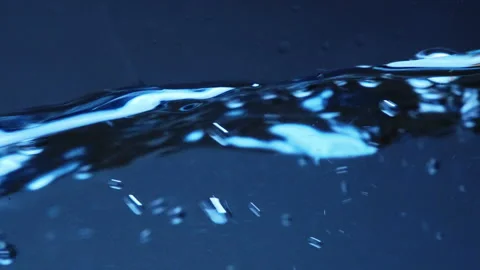 Water waves in white background slow motion Vídeos de archivo 242466447