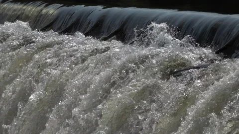 Water at weir of a hydropower plant Stock Footage 157828245