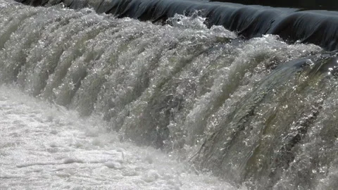 Water at weir of a hydropower plant Stock Footage 157828499
