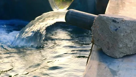 Water from a well filled a pond for Stock Video Pond5