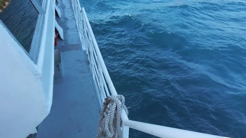 Water wetting the deck of a catamaran Stock Footage 126841193