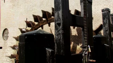 Water wheel in operation, powering an ancient gristmill Video stock 62805641