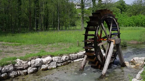 Water wheel in the river Stock Footage 32256047