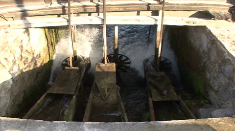 Water wheels are turning under the old mill Stock Footage 35955541