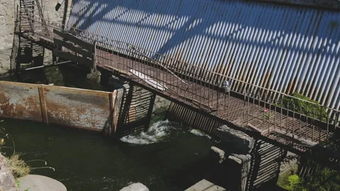 Water Whirlpool on an Old Rusty Hydro Power Plant Stock Footage 139194384