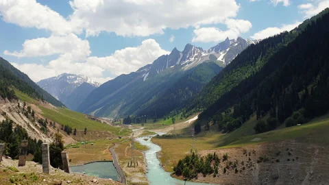 Water white blue colours running in a rivers around with hills green plants a Stock Footage 144344816