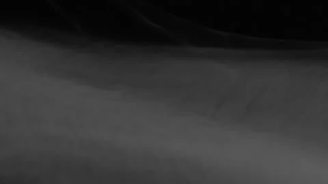 Water-like white mist streams into frame from the bottom and fades out slowly. Stock-Footage 337455031