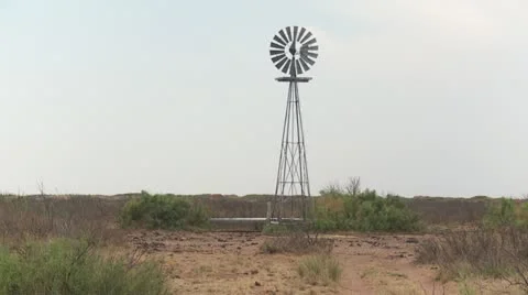 Water Windmill slow roatation Stockbeeldmateriaal 12130966