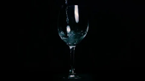 Water wineglass slow motion Stock Footage