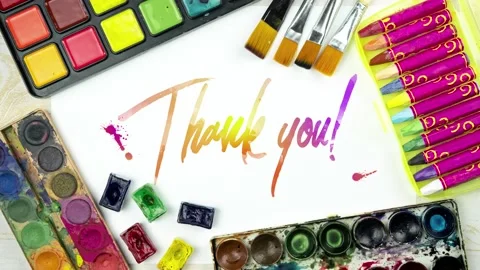 Watercolor background, flat lay with paint palette, brushes, thank you Stock Footage 135658718