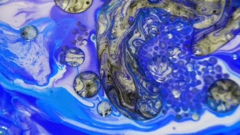 Watercolor paints creating bubbles. Multi-colored oil paints beautiful patterns. Stock Footage 118092656