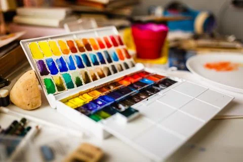 Watercolors box on table Stock Photos