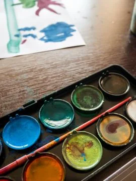 Watercolors on desk 스톡 사진