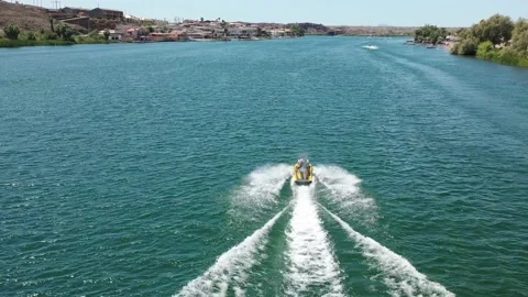 Watercraft Speeding Along A River Vídeo Stock 209294537