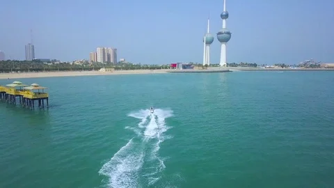 Watercraft with towers in the background Stock Footage 126513549