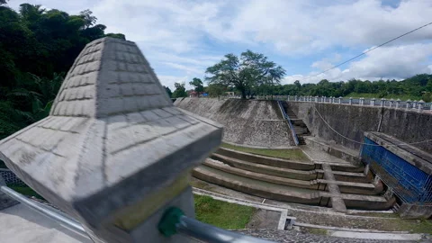 Waterdam channel split systems view from camera walk behind the concrete Stock Footage 240833923