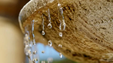 Waterdrops in Slow Motion, Macro Close-Up of Flowing Fountain Stock Footage 282863190
