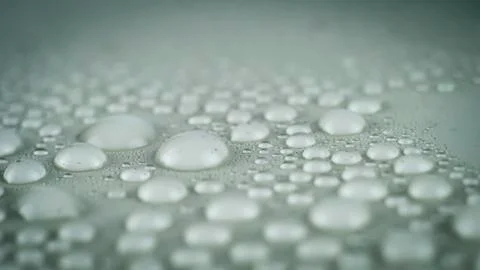 Waterdrops in white background Stock Photos