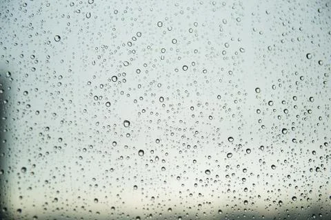 Waterdrops on the window. Close-up. Stock Photos