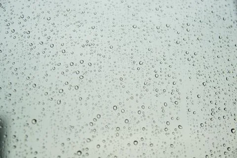 Waterdrops on the window. Close-up. Stock Photos
