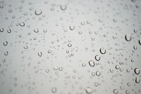 Waterdrops on the window. Close-up. Stock Photos