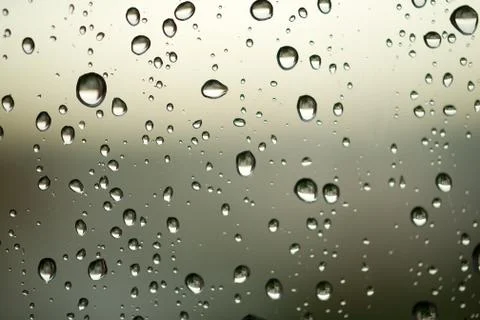 Waterdrops on the window. Close-up. Stock Photos