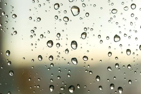 Waterdrops on the window. Close-up. Stock Photos