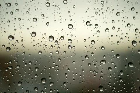 Waterdrops on the window. Close-up. Stock Photos