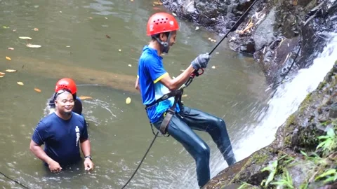Waterfall Abseiling Stock Footage 146596264