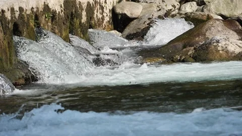 Waterfall along river Brembo Stock Footage 131297348