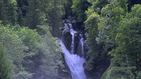 Waterfall on alpine mountain Stock Footage 82354336