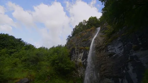 Waterfall on alpine mountain Stock Footage 82354350