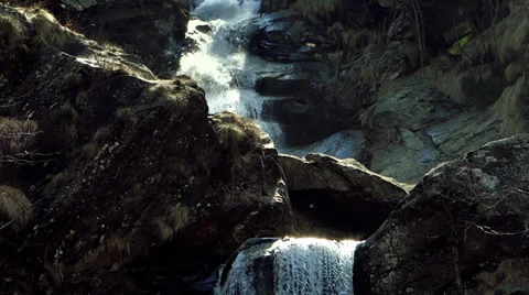 Waterfall in the alps Video stock 34342648