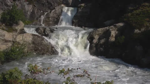 Waterfall in Alps Forest Stock Footage 23569001