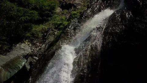 Waterfall in the alps mountains Video stock 154104954