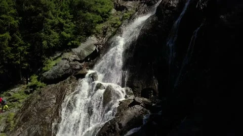 Waterfall in the alps mountains Stock Footage 154105153