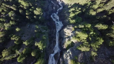 Waterfall in the alps mountains Video stock 154106036