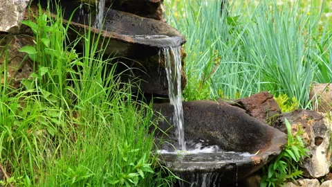 Waterfall among the stones. Video stock 103461679
