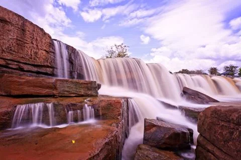 Waterfall and blue sky Stock Photos