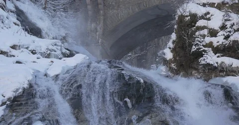 Waterfall and bridge column Stock Footage 82744301